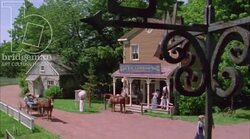 Street scene with storefront and horses in small town, 1908 - reenactment Stock Footage
