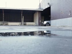 WS Two young men driving out of lumberyard in truck / Minneapolis, Minnesota, United States Stock Footage