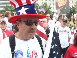 VOICED: Tens of thousands rally against Obama government News Clip