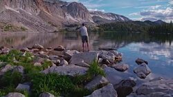 4k Slow Motion Fly Fishing inï¿½Mountain Lake at Sunrise Stock Footage