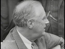 1943: ALLIED CONFERENCE: President Franklin Delano Roosevelt sitting w/ British Prime Minister Winston Churchill, CU Both. PAN Officers BG: General Hap Arnold, Sir Charles Portal, General Brooke, Admiral King, Sir John Dill, General George C. Marshall Instructional Video