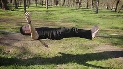 Lying and maintain balance on the rope Stock Footage