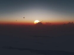 Sunrise above the clouuds Stock Footage