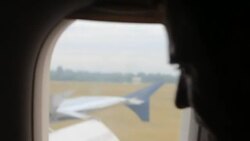 Scared man in the plane of rough landing Stock Footage