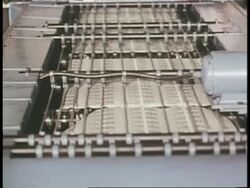 Printers at the U.S. Department of the Treasury in Washington, D.C., produce stacks of currency. News Clip