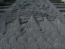 An intricately carved stone stairway leading up to a Chinese Palace. Stock Footage