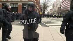 Riot police and protesters on Washington streets News Clip