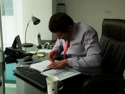 Businessman working in an office  Stock Footage