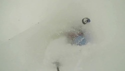 Young man skier skiing down mountain in Japan. - Slow Motion Stock Footage