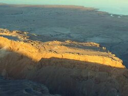 WS AERIAL POV Cave on mountain / Masada, Sourn Judea Desert, Israel  Stock Footage