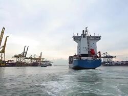 Shipyard working loading container cargo freight ship at sea Stock Footage