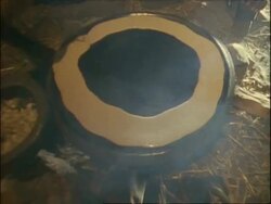 CU High angle, mixture being poured on to hot plate to make pancakes, Ethiopia, Africa Stock Footage