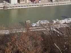 MS TU T/L Over river to city / Pittsburgh, PA, United States Stock Footage