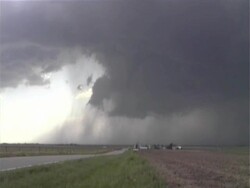 Short funnel tornado, Big Springs, Nebraska, base of funnel and debris cloud, zoom out, WA, USA Stock Footage