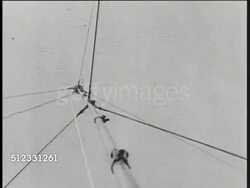 1939: NAZI WWII PROPAGANDA: German soldier reading orders on paper, another soldier typing on typewriter. TU Pole w/ extending wires. MS German soldiers in open vehicle w/ radio, MS Soldier operating radio. Instructional Video
