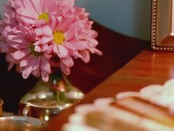 CU PAN Antique photos, jewelry, and miscellaneous items atop old dresser / Tampa, Florida, USA Stock Footage