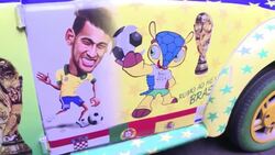 Football loving car owners decorate their vehicles for the World Cup News Clip