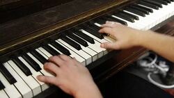 HD Video of Woman's Hands Playing Music on Piano Stock Footage