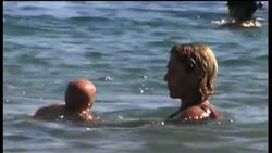 Acrobatic baby yoga on the beach News Clip