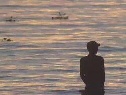 MS Lone fisherman silouette lake at sunset / Buikwe, Uganda Stock Footage