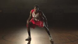 A basketball player demonstrates his dribbling skills. Stock Footage