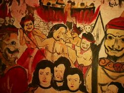 MS Shot of drawings of faces and people on temple wall / Luang Prabang, Laos Stock Footage