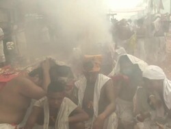 Firecrackers explode on Devotees at Phuket Vegetarian Festival Stock Footage
