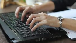 Women's hands typing on keyboard  computer Stock Footage
