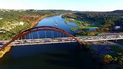 Flyby Over Pennybacker Bridge or 360 Bridge Austin Texas Colorado River Fly Over Stock Footage