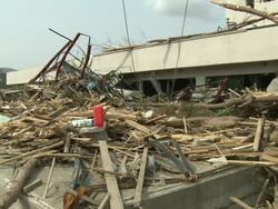 Interior of destroyed Rikuzentakata city hospital, Iwate Prefecture, Japan on 2nd April 2011; 3 weeks after the tsunami following the Tohuku earthquake of March 2011. Stock Footage