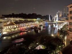 T/L High angle view over river and restaurant in Singapore, at night Stock Footage
