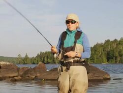 MS Shot of Woman fly fishing at long Pond / Maine, United States Stock Footage
