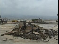 WRAP Airport, cleanup of oil spill, destruction, voxpops, bridge being repaired News Clip