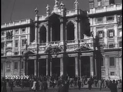 1940s: BASILICA DI SANTS MARIA MAGGIORE: VS EXT Basilica of Saint Mary Major. LA EXT Front w/ fountain FG. 1950: His Eminence Archbishop of New York Francis Cardinal Spellman carrying Christian cross followed by American Pilgrims, American flag Instructional Video