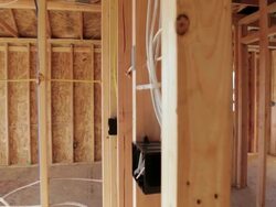 MS PAN Shot of Interior of home under construction wall / Portland, Oregon, United States  Stock Footage