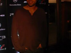 Adrian Grenier at the Mercedes-Benz Exclusive Preview Of The 2011 SLS AMG In Grand Turismo 5 at Los Angeles CA. (Footage by WireImage Video/GettyImages) Stock Footage