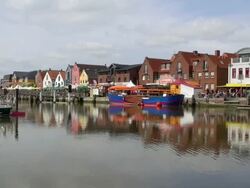 WS View of boats on harbor and old town, North Sea North Frisia, / Husum, Schleswig Holstein, Germany Stock Footage