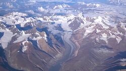 Aerial view of the Himalayas mountain range from the airplane window Stock Footage