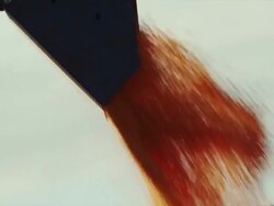 Extreme close up auger dumps corn into a wagon. Stock Footage
