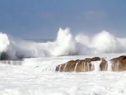 WS Waves crashing shore on lava rocks   / Haleiwa, Hawaii, United States Stock Footage