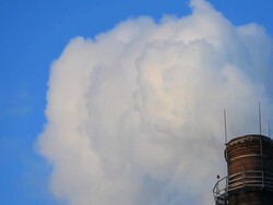 Smoke Stack on blue sky Stock Footage