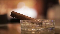 Cigar in the ashtray Stock Footage