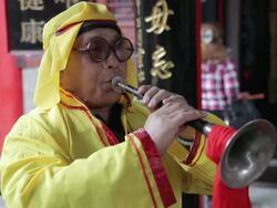CU Villagers performing trumpet in temple fair during chinese spring festival  AUDIO  / tongchuan, shaanxi, china Stock Footage