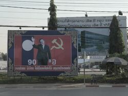 WS traffic and communist billboard / Vientiane, Laos Stock Footage