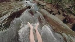 Sliding on rocks Stock Footage