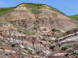 Rock formations forming a hill in the Badlands Stock Footage