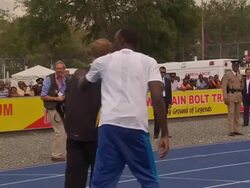 Prince Harry and Usain Bolt on running track News Clip