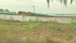 Driving shot out of Pyongyang News Clip