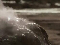 CU SLO MO Shot of Hot water spurting out of geyser at El Tatio geysers / San Pedro de Atacama, Norte Grande, Chile Stock Footage