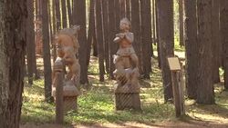 Wooden sculptures in fantastical forest News Clip